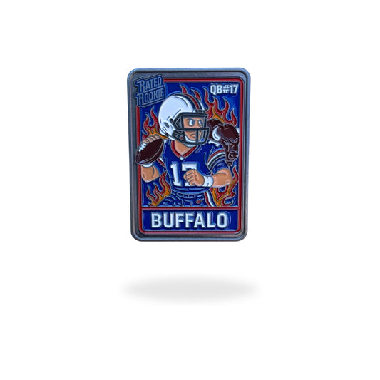 Illustrated enamel ball marker styled like a vintage football rookie trading card, featuring a cartoon quarterback in a red and blue Buffalo uniform mid-throw, with flames in the background and bold “Rated Rookie” text. Designed for golf use with collectible appeal.