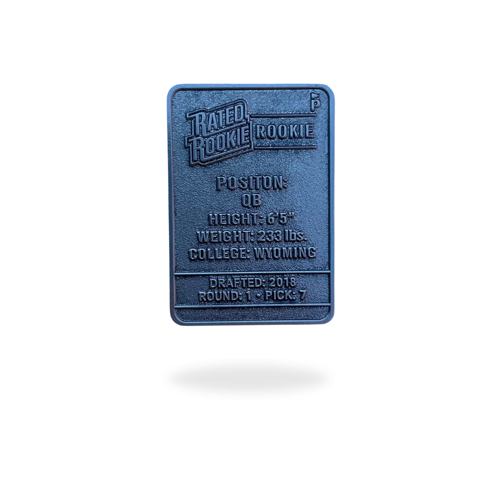 Illustrated enamel ball marker styled like a vintage football rookie trading card, featuring a cartoon quarterback in a red and blue Buffalo uniform mid-throw, with flames in the background and bold “Rated Rookie” text. Designed for golf use with collectible appeal.