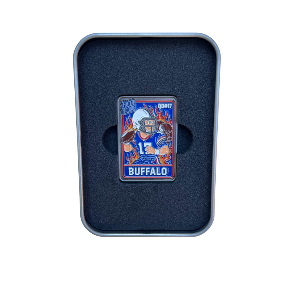Illustrated enamel ball marker styled like a vintage football rookie trading card, featuring a cartoon quarterback in a red and blue Buffalo uniform mid-throw, with flames in the background and bold “Rated Rookie” text. Designed for golf use with collectible appeal.