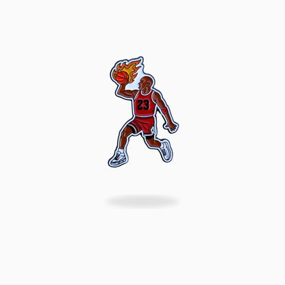 Illustration of a basketball player in a red uniform with a flaming basketball on a white background ball marker for golf