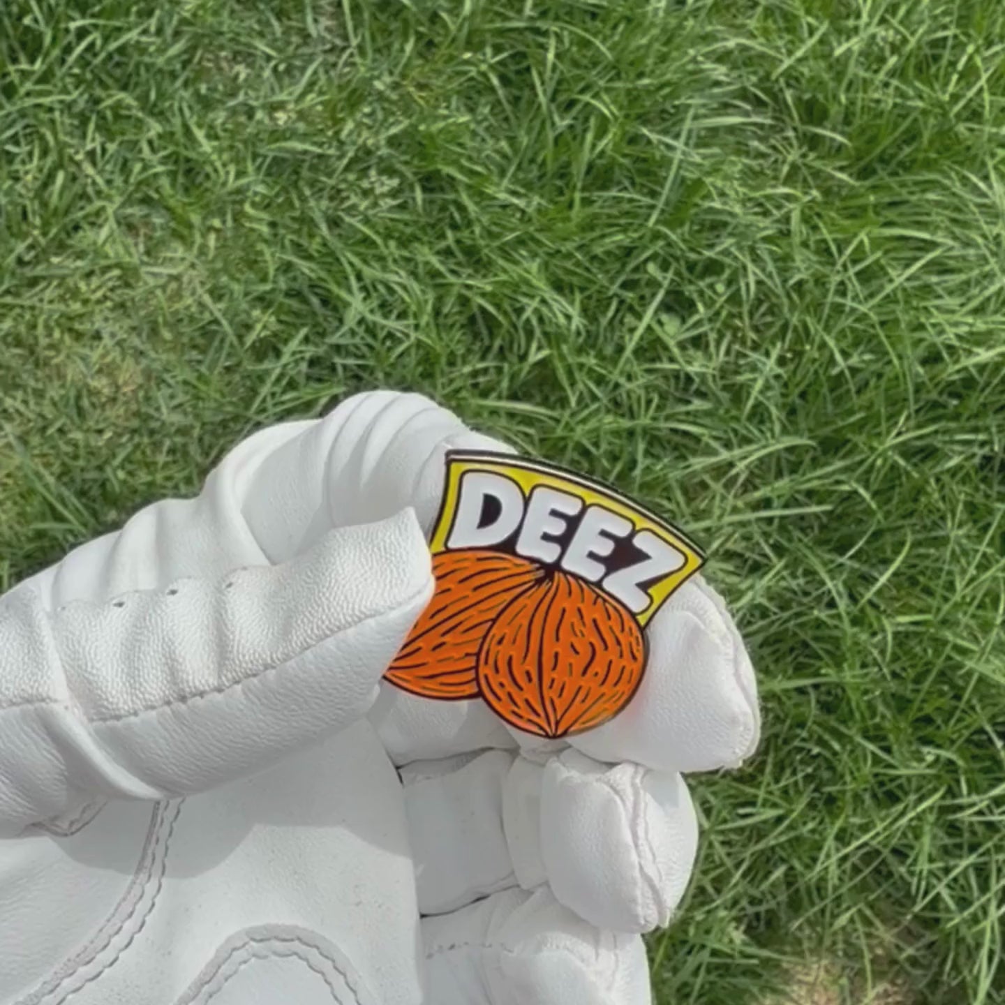 DEEZ Nuts funny golf ball marker by Pin Creatures with black nickel enamel finish